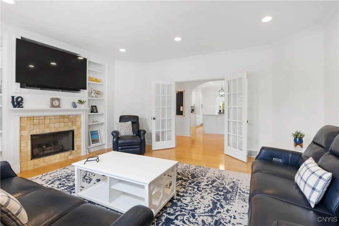Note the view of the kitchen through the French doors.