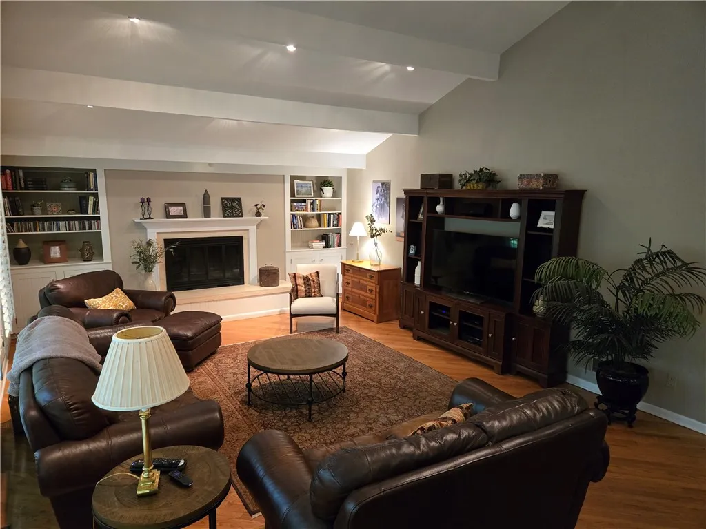 This room is huge and has vaulted ceilings with lighting.