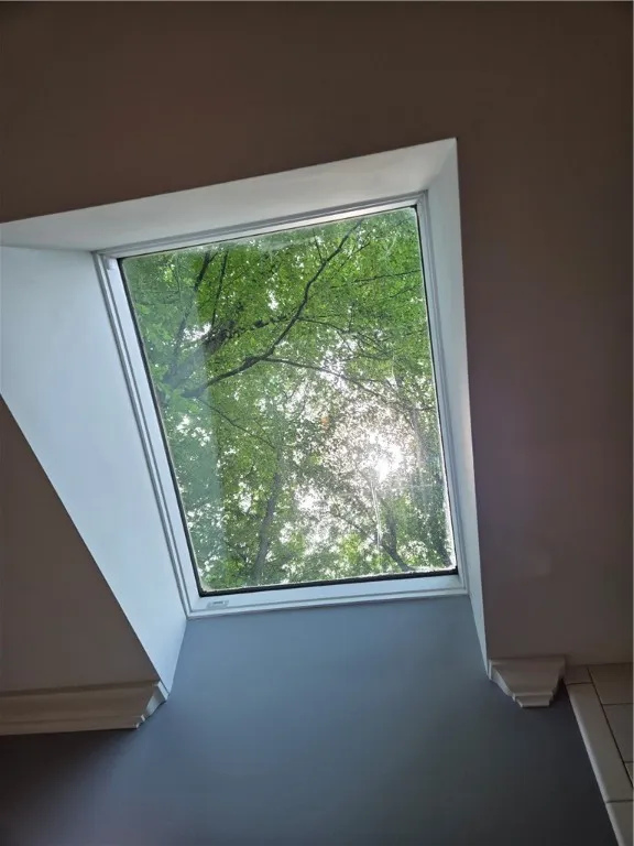 The skylight over the tub offers a great view.