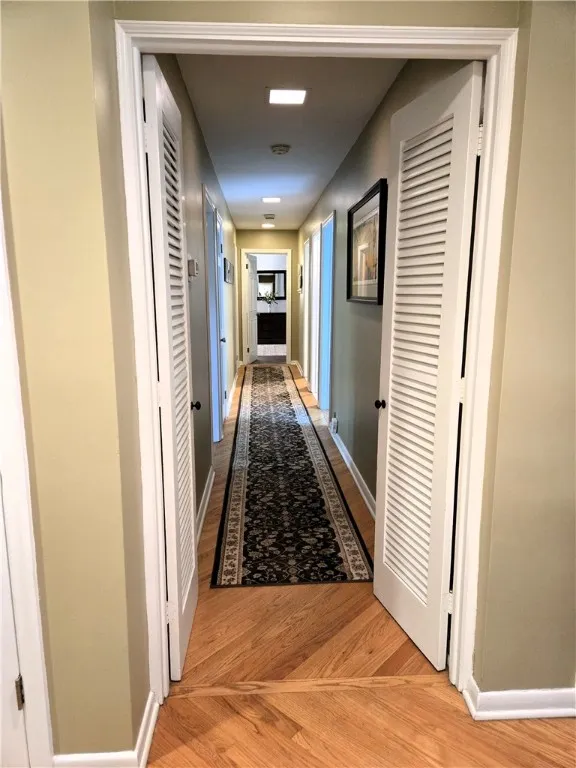 Down a long hallway with shutter doors...