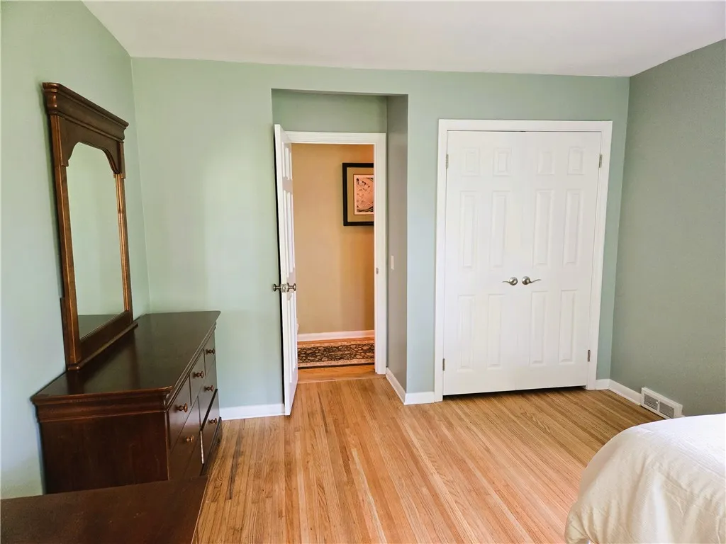 This is bedroom number four, also with a double closet.