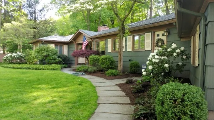 Enjoy the fabulous foundation gardens along the walk.