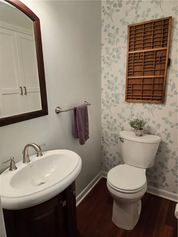 A convenient powder room just off the kitchen.