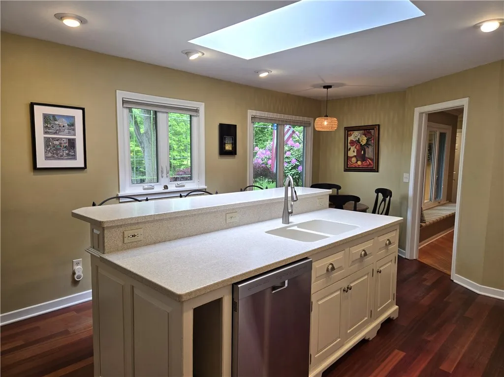 Check out the island and gorgeous quartz countertops.