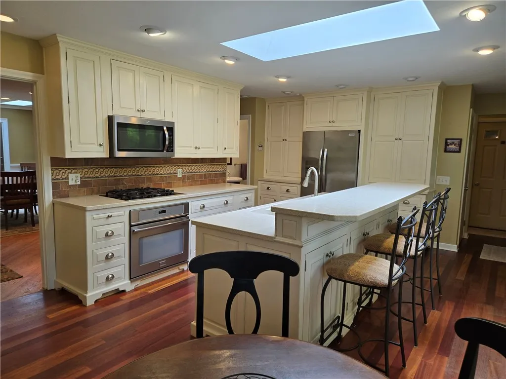 Light and bright with lots of storage and space for friends to gather.