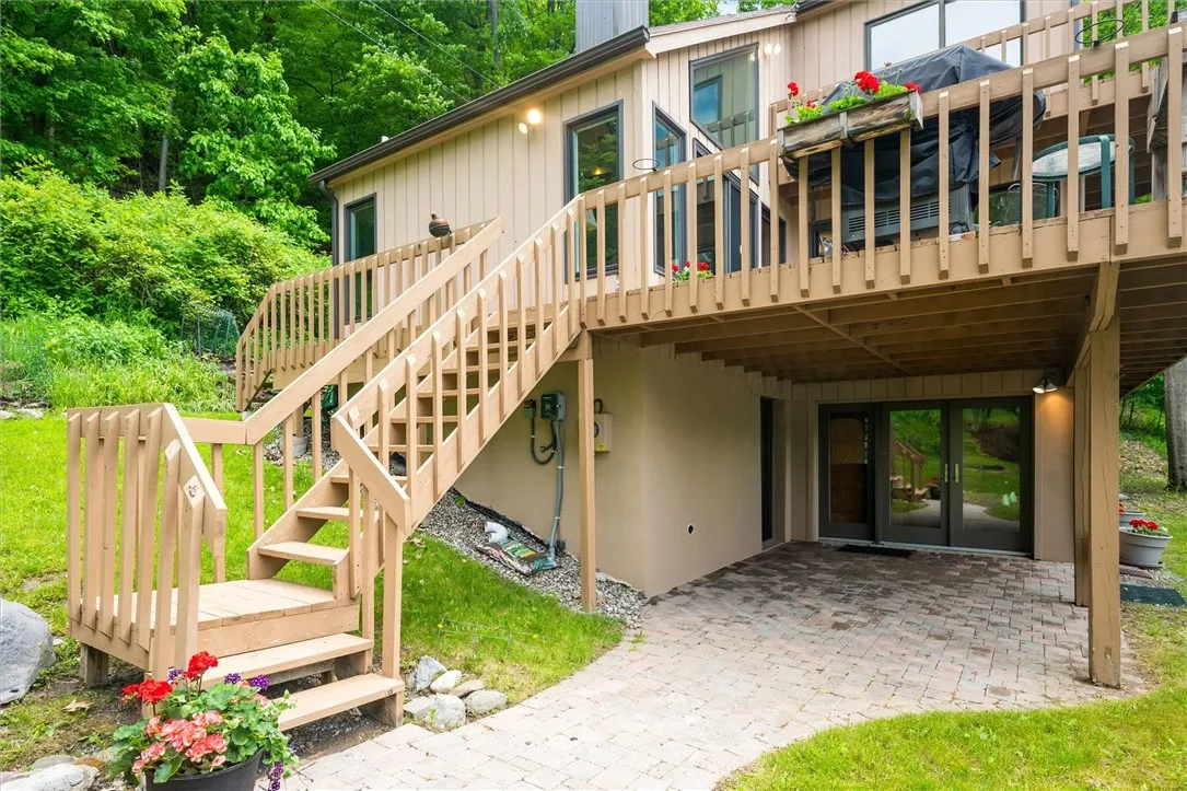 Entrance to walkout lower level and main level deck.
