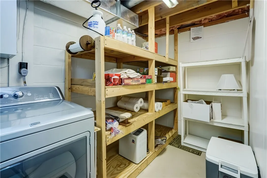 Laundry room w/storage.