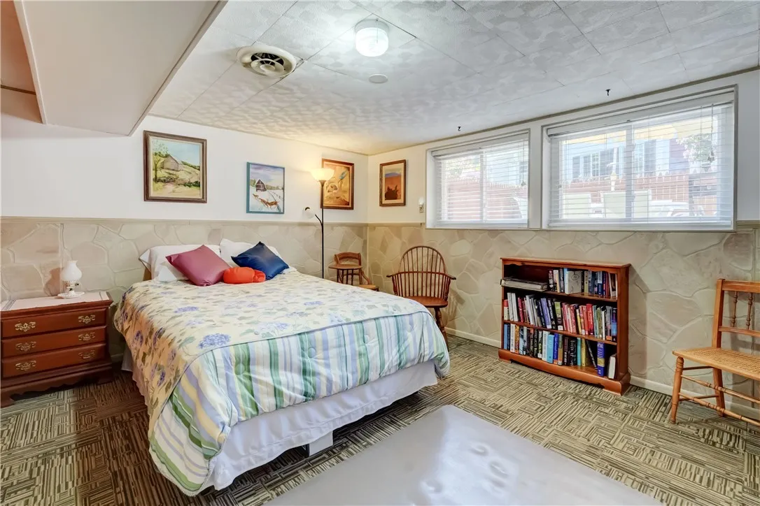 Lower level bedroom suite/living room/den