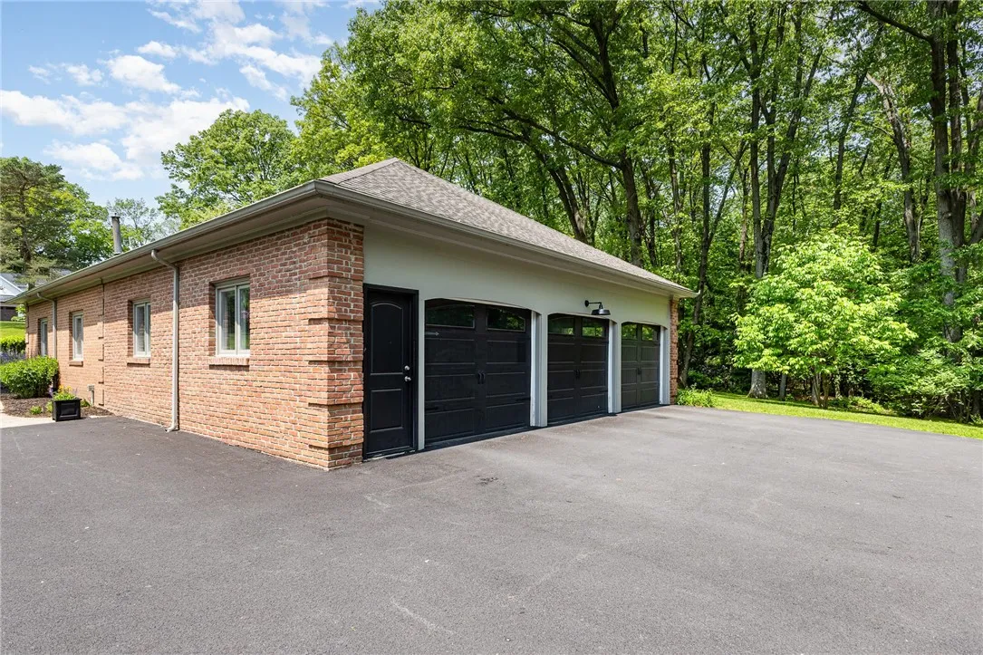 3 car bay and drivewary turnaround can accommodate all your guest!