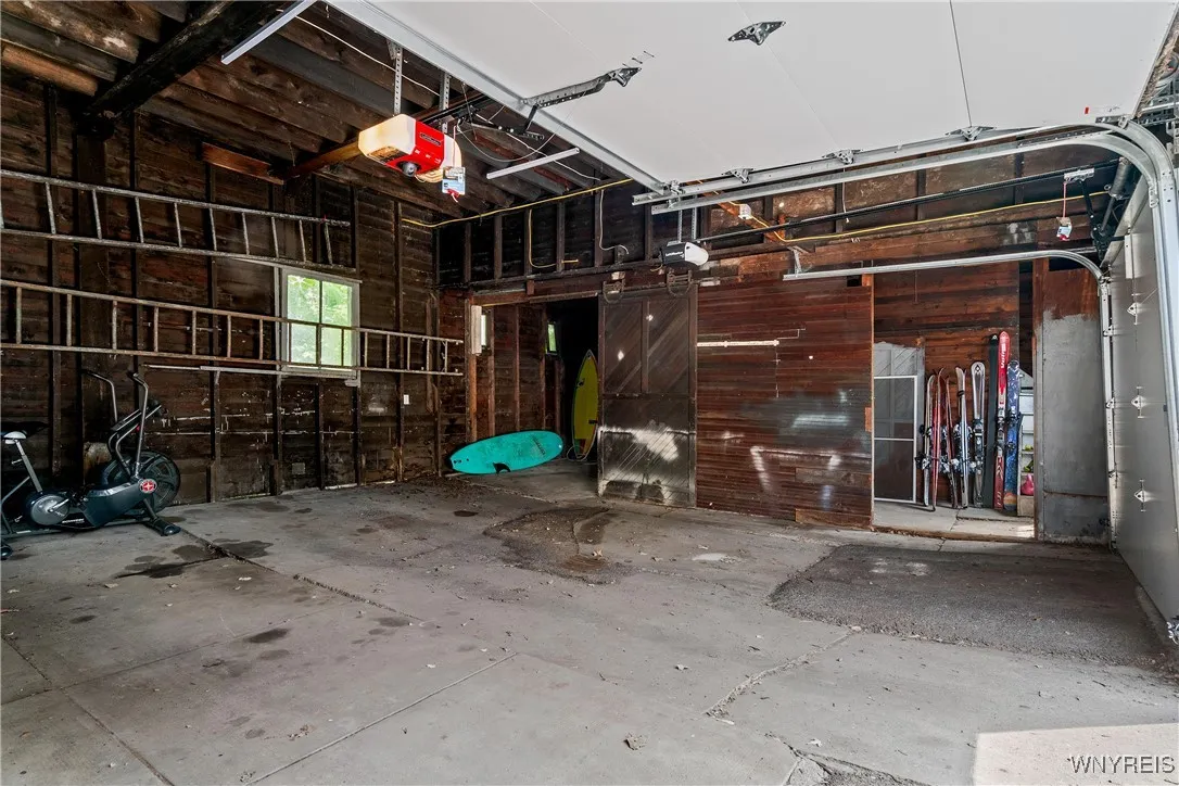 Three car garage with second story storage