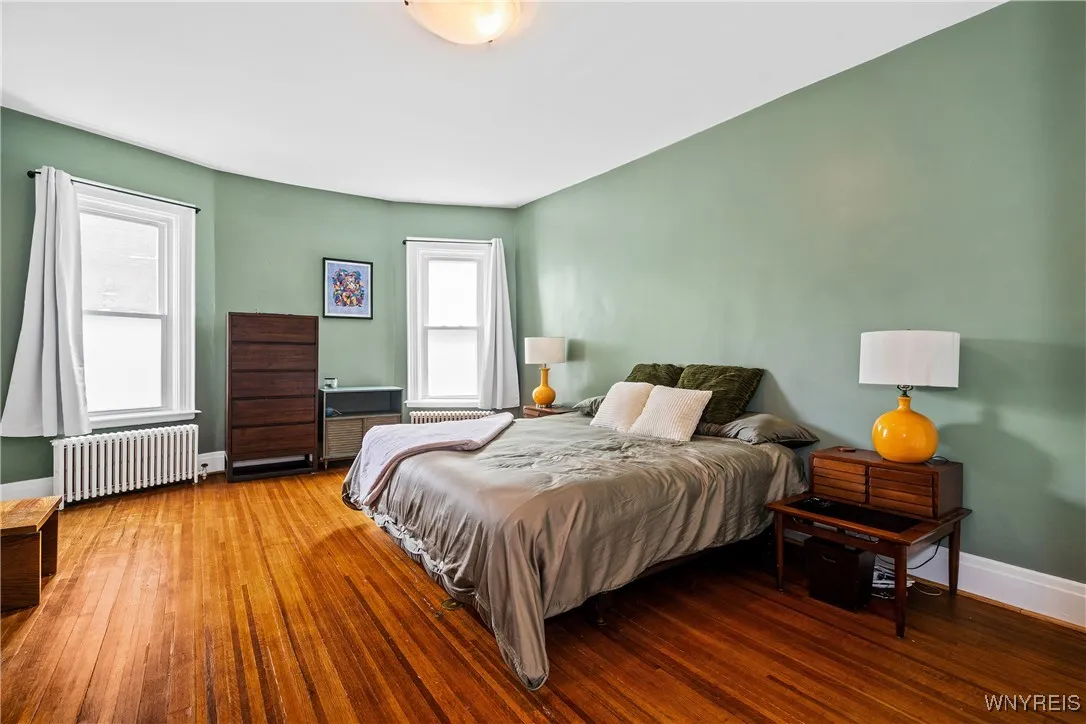 First floor apartment primary bedroom with ensuite bathroom