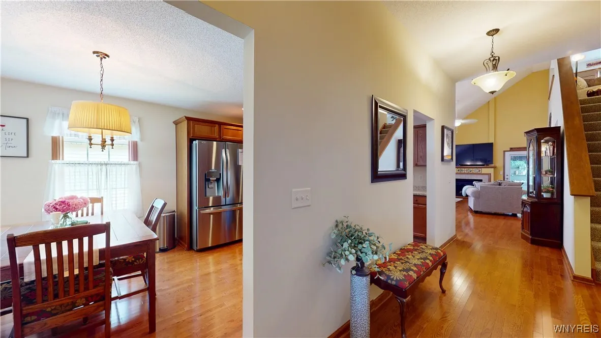 Foyer leads the way to a glistening hardwood thoroughfare