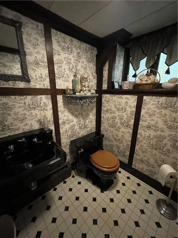 Half bath in finished basement.