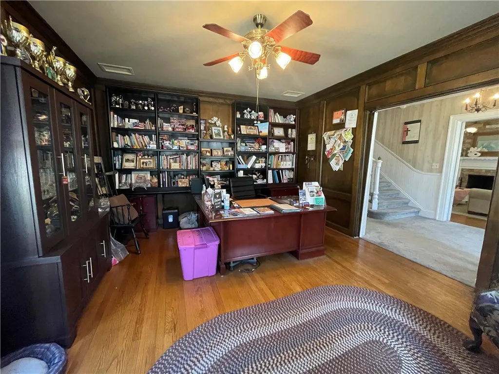 Downstairs office/library with pocket doors.