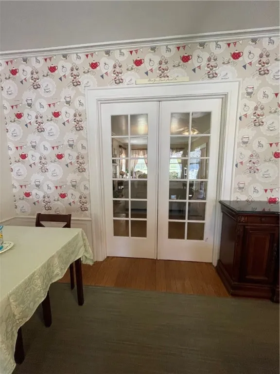 Pocket French doors between dining room & living room.