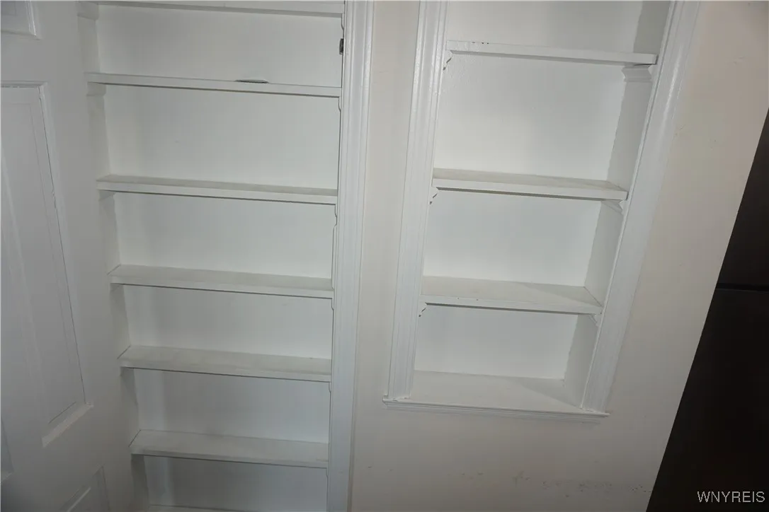 Spice cabinet & built in shelves.