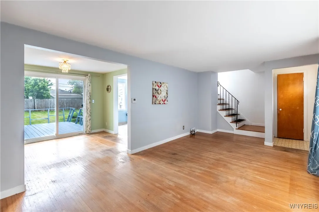Good overview - front entrance / coat closet, along with family room and dining room.