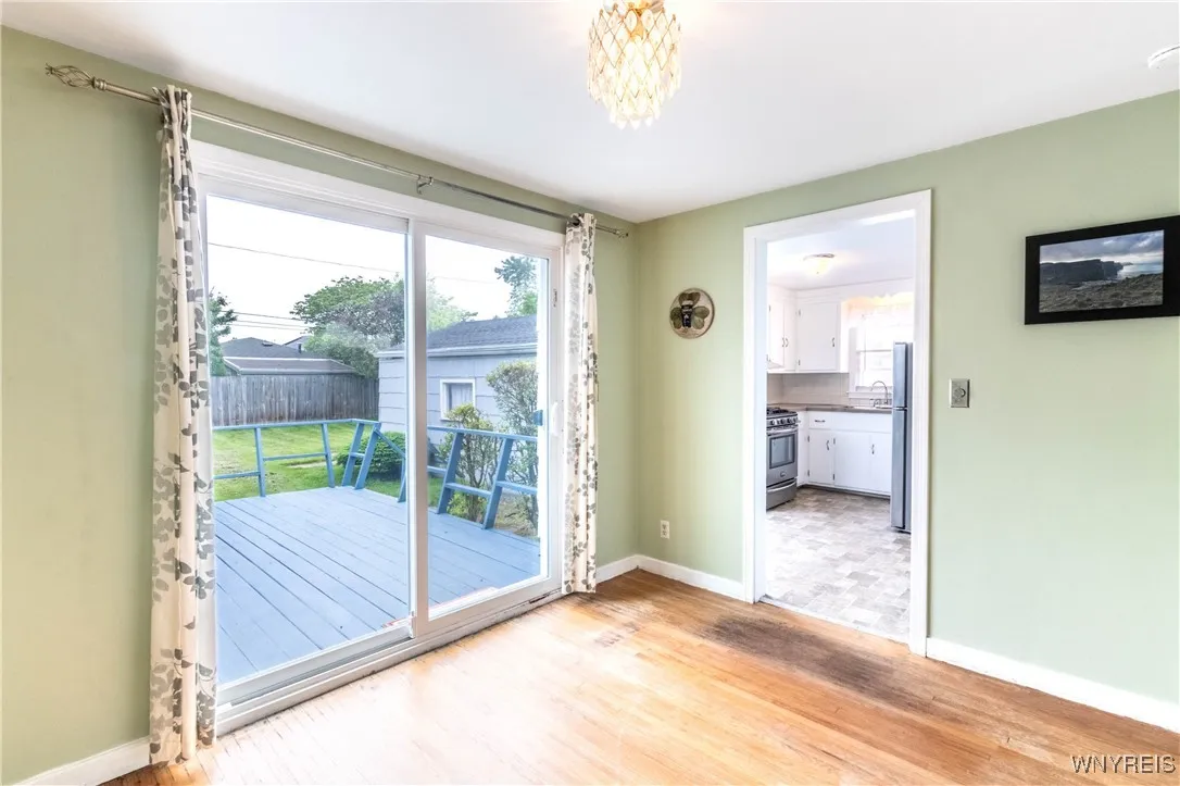 Dining room leads to your backyard deck through a nice sliding patio door.