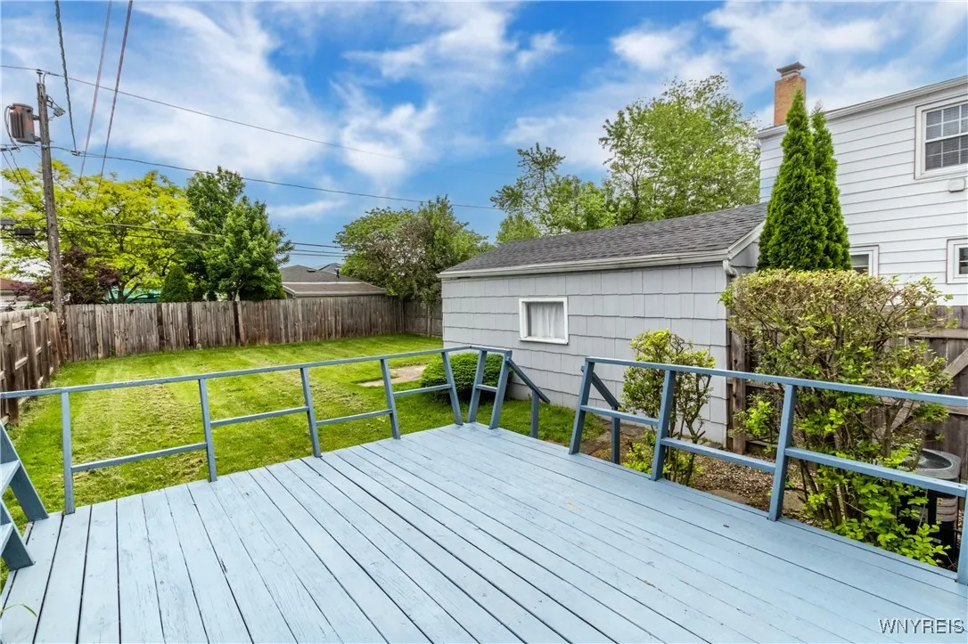 Deck overlooks your fully fenced back yard.