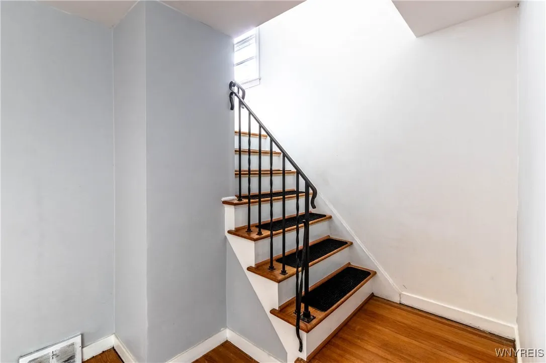 Very nice wood stairs that I believe are oak (not 100% sure but they are really nice!)