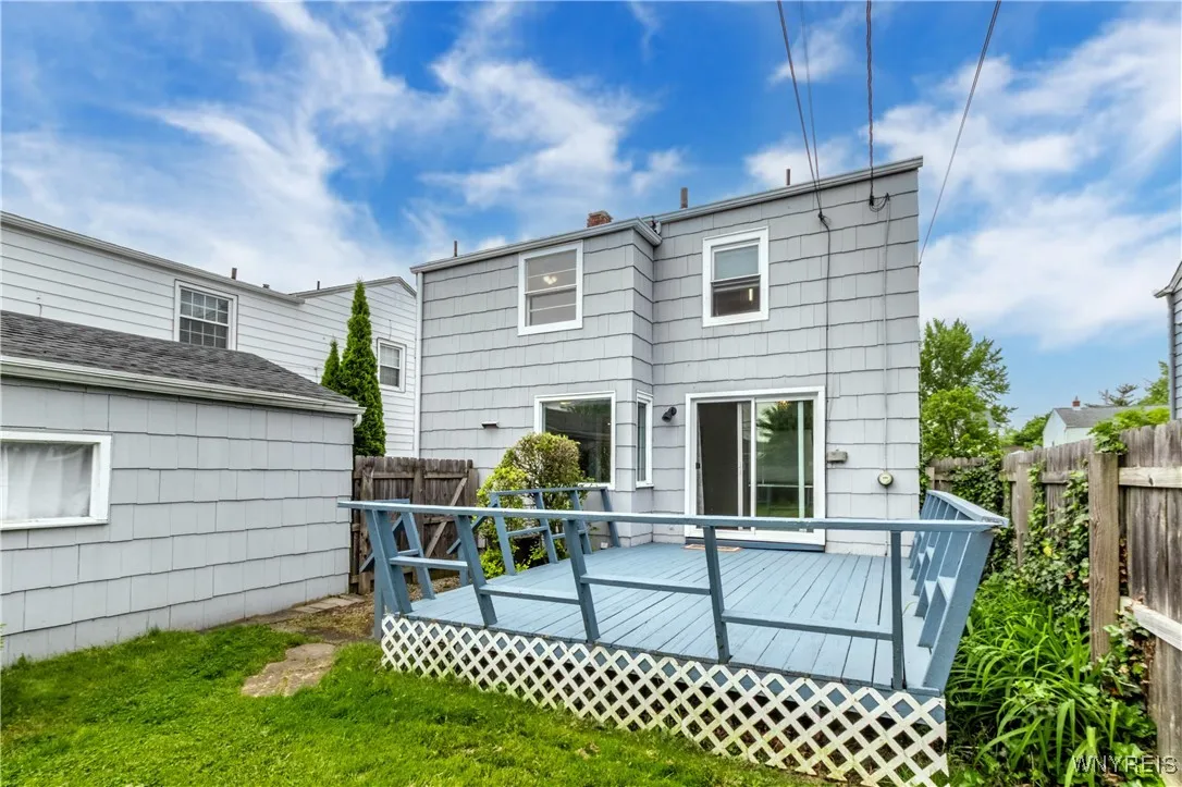 Garage on left is convenient to the deck and the entire backyard.