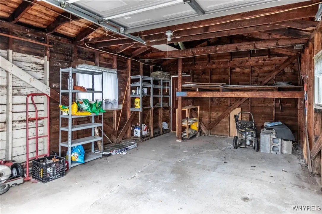 Garage saves you from scraping your car in winter, and some built-in storage too!