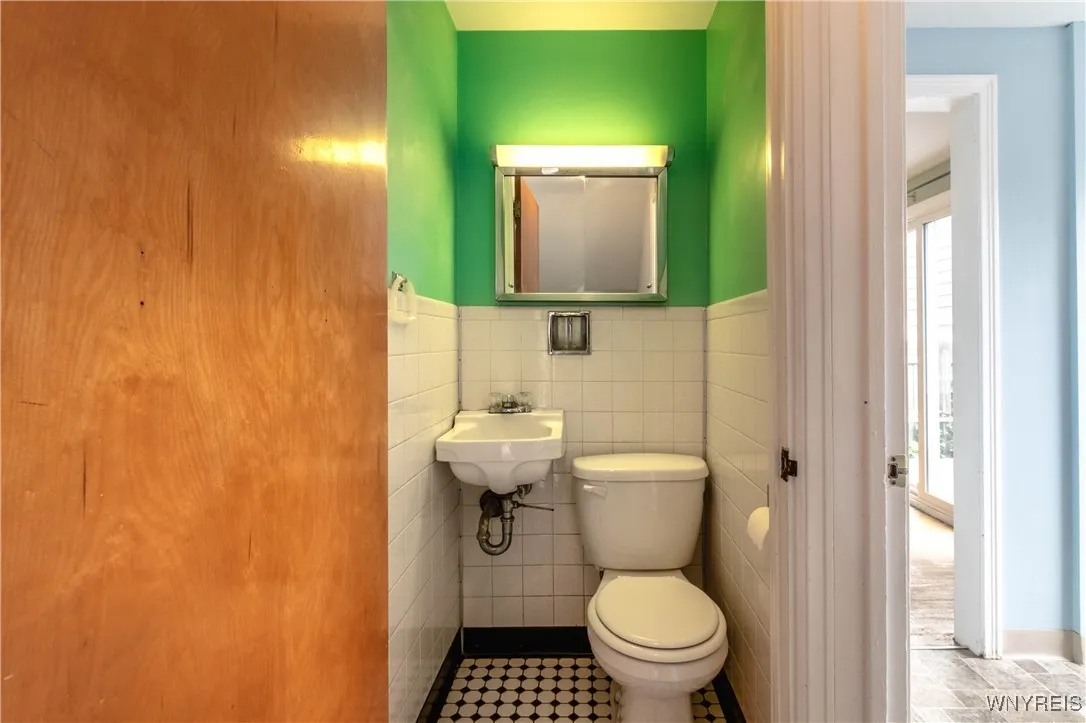 1/2 bath just off the kitchen is very convenient
