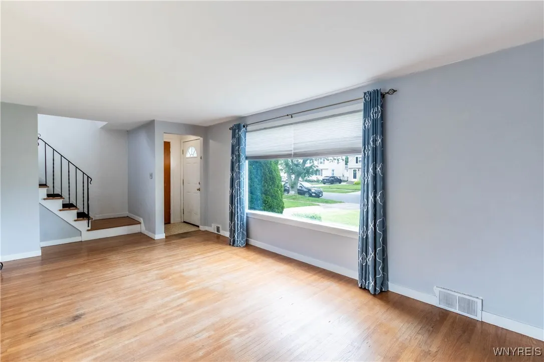 Nice shot of the entrance and the large family room and window