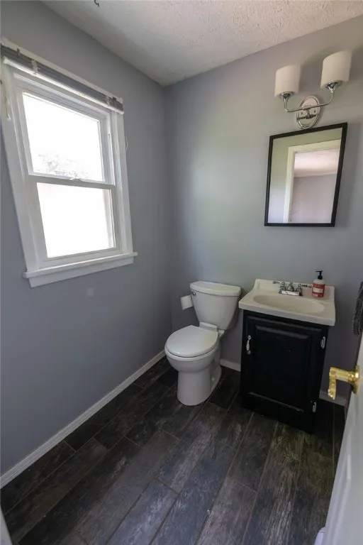 Half bath with newer vinyl flooring