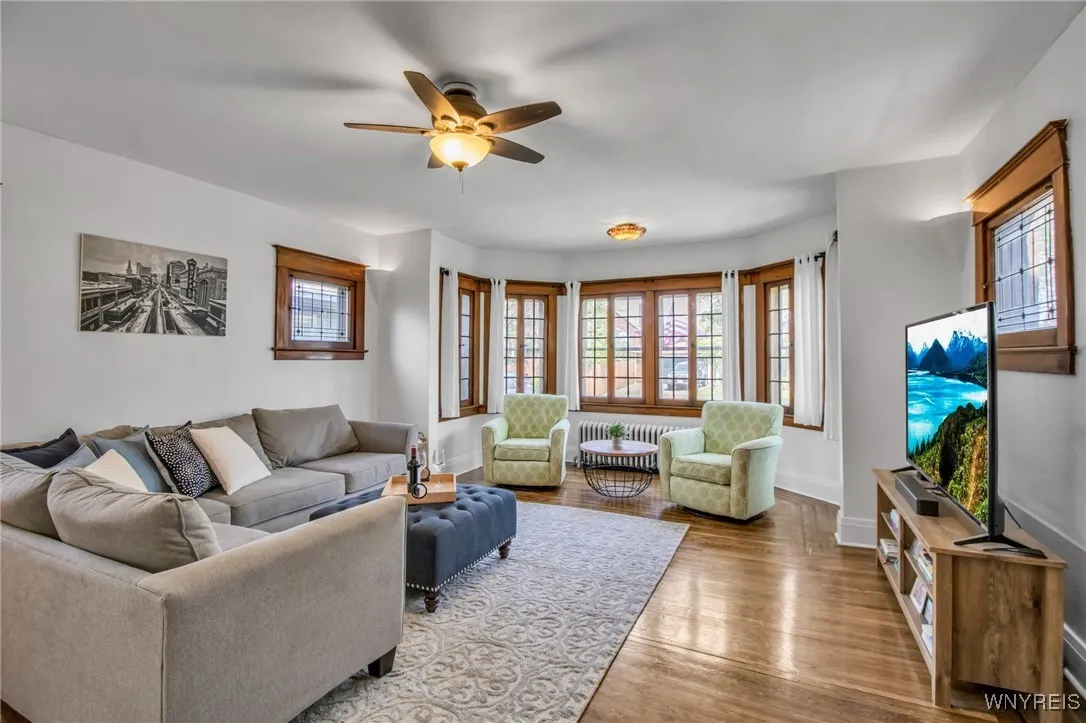 Spacious LR with gleaming hardwood flooring...