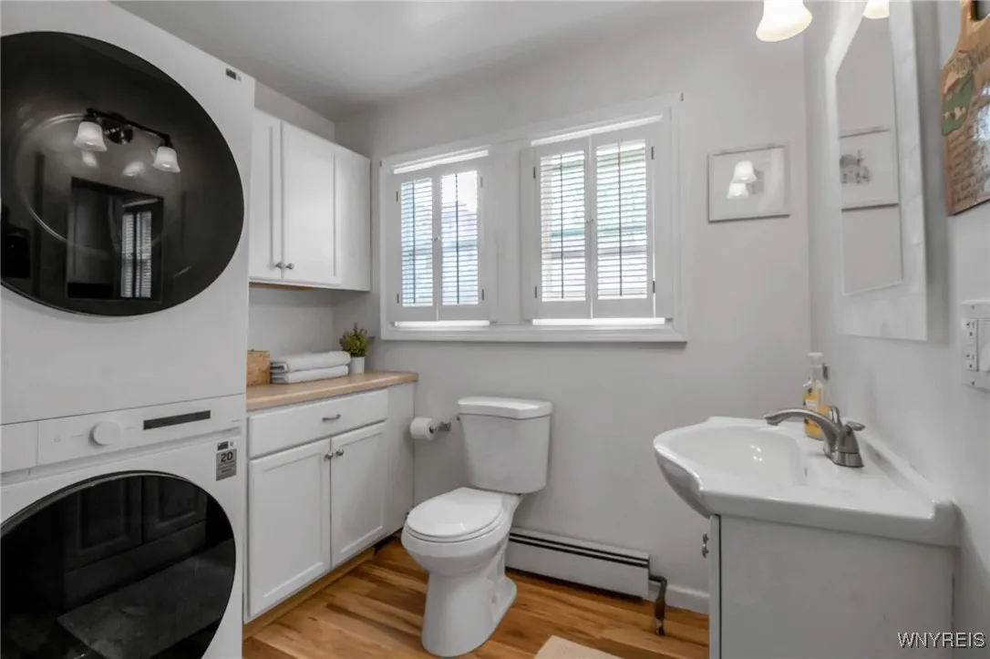 Large 1st Floor Half Bath and Laundry with storage...