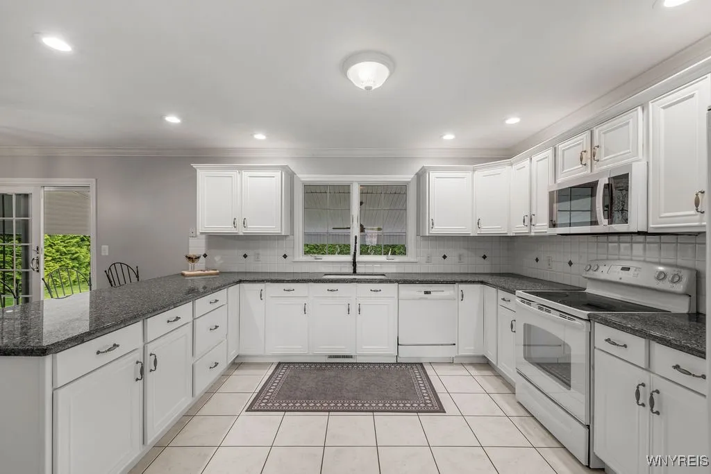 Large kitchen with granite