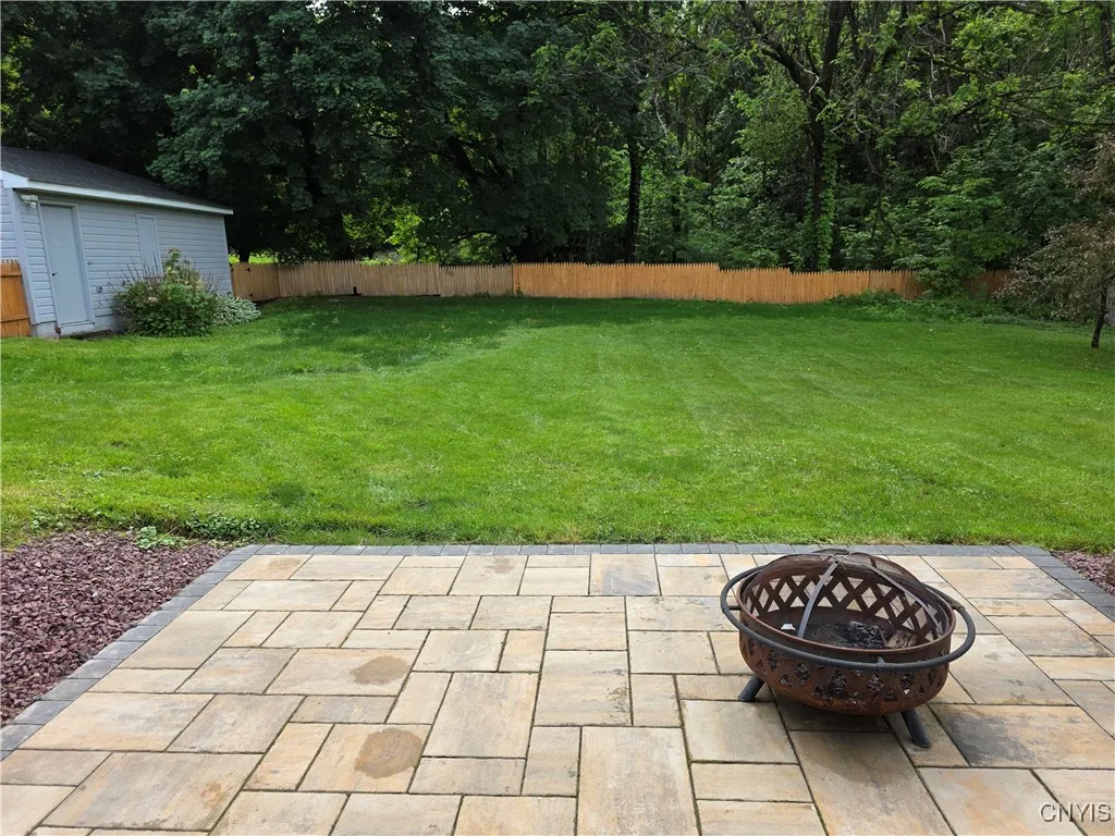 patio and fenced-in rear yard