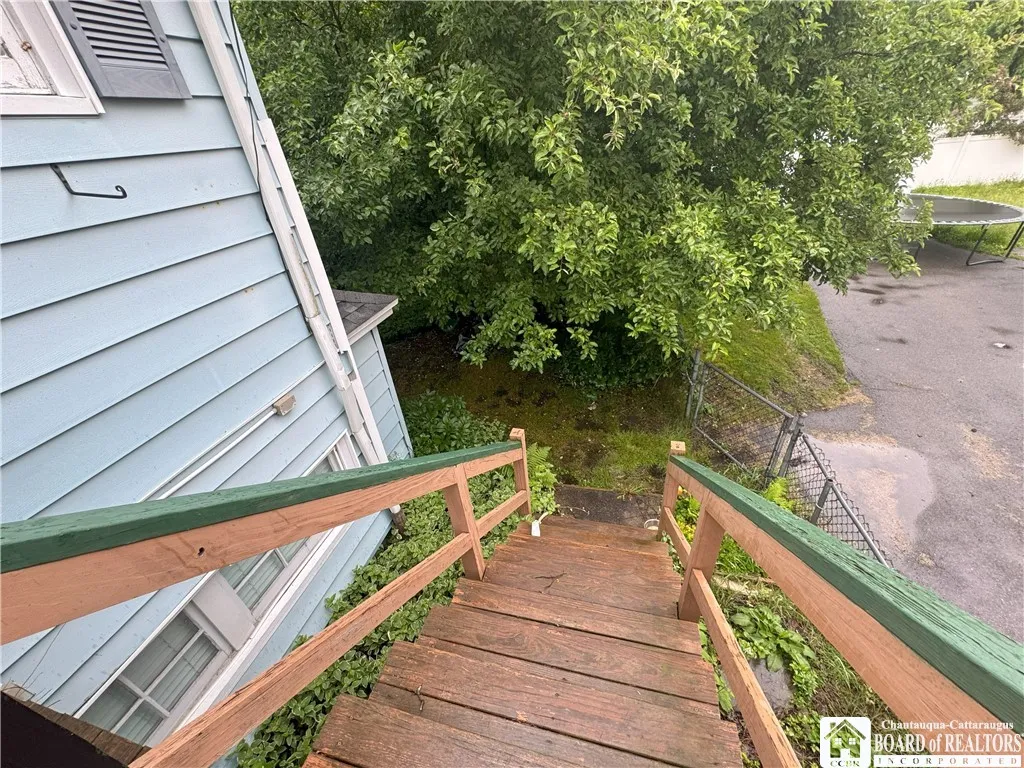 Staircase going to back yard