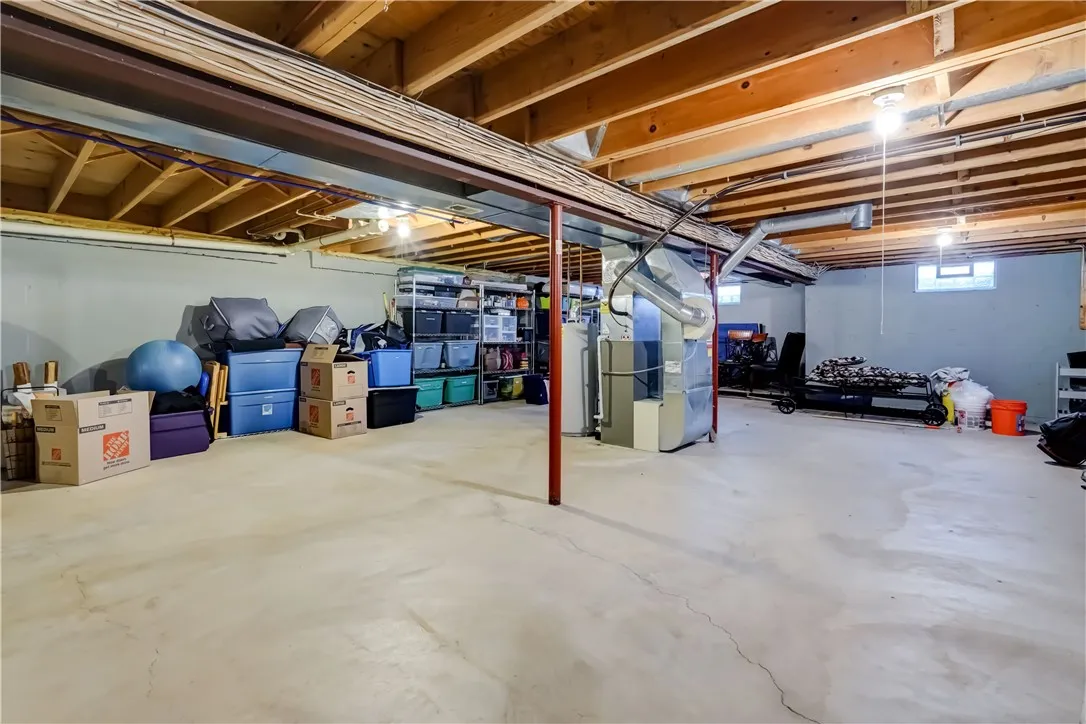 Huge basement with glass block windows. Room for tons of storage. Turn it into a gym, workout area, workshop or all 3!