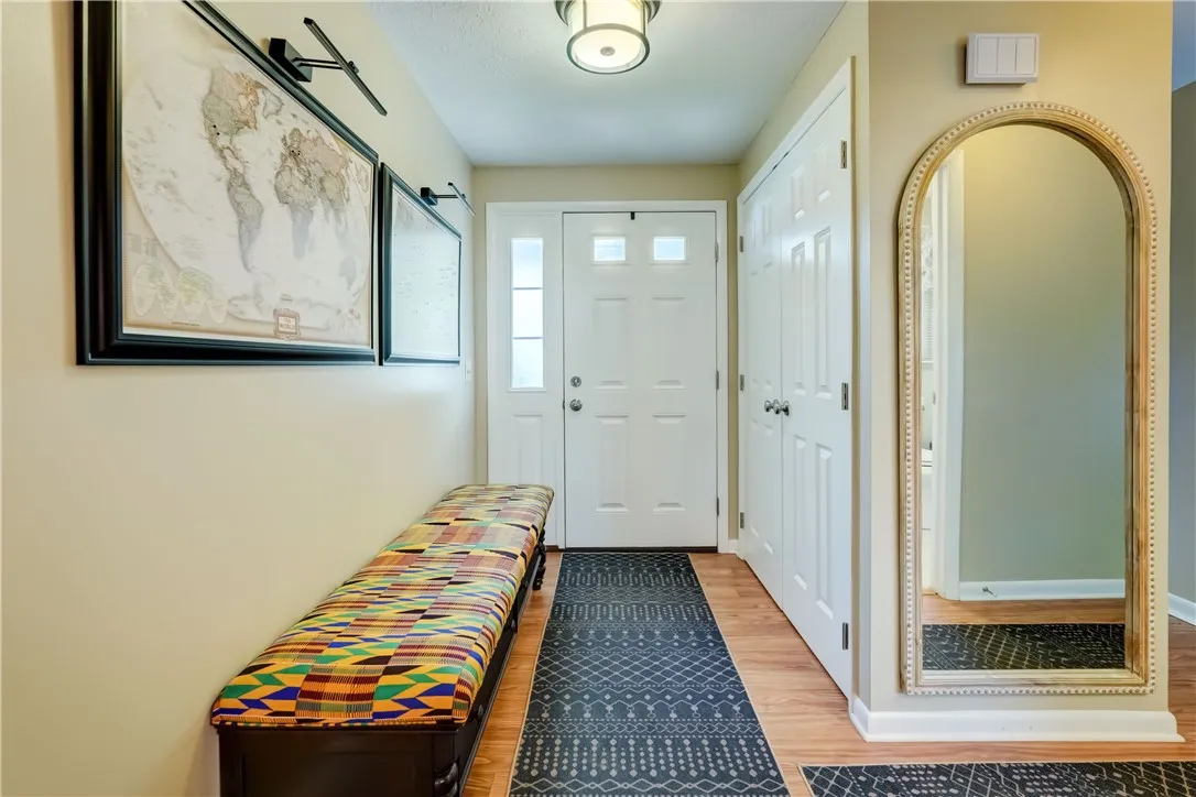 Inviting front hallway with large closet