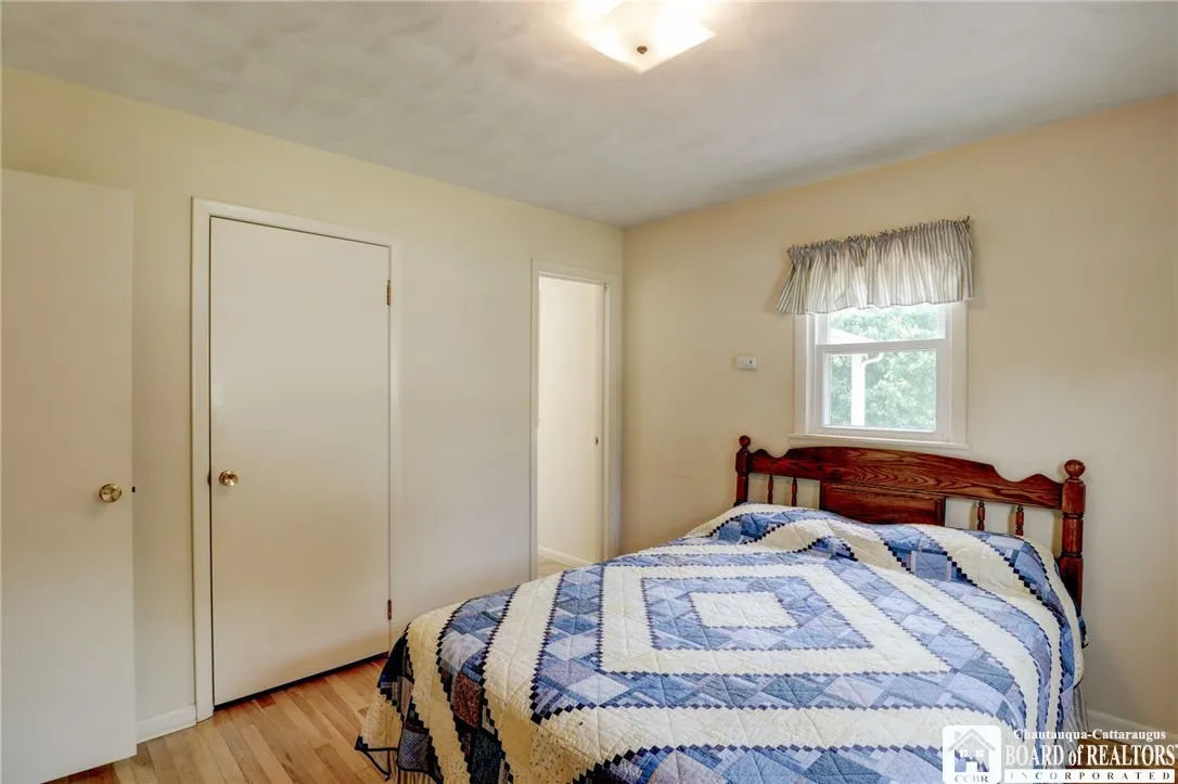 Bedroom #1... door to the half bath