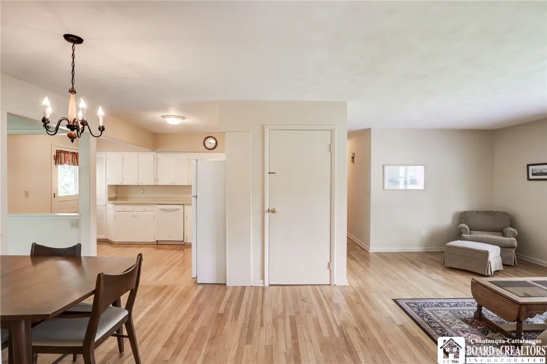 Open concept...living room, dining area, kitchen...door to the basement