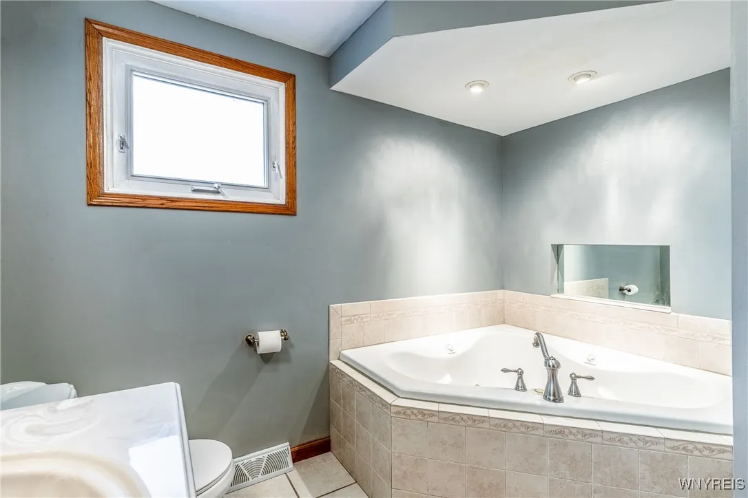 Sizable bathtub in 1st floor bathroom