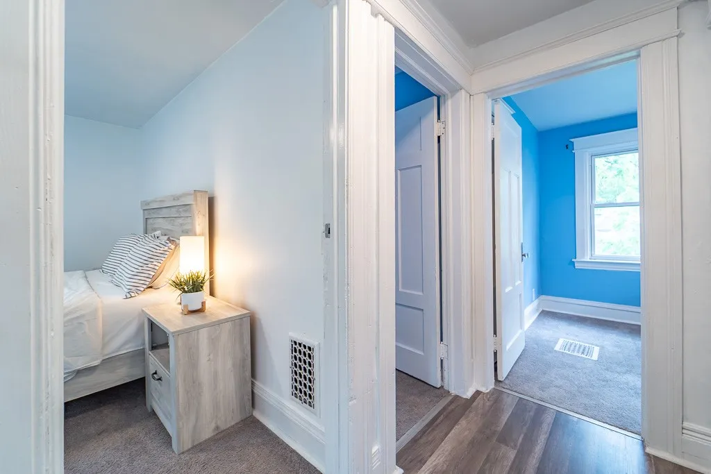 Upstairs the private quarters offer spacious bedrooms, a cozy office nook, and a well-appointed family bath—providing comfort, functionality, and room to unwind.