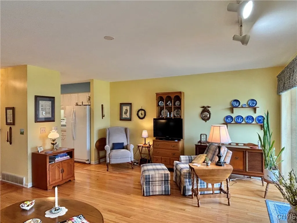 Living room.  Notice the prewired outlet for a ceiling fan.
