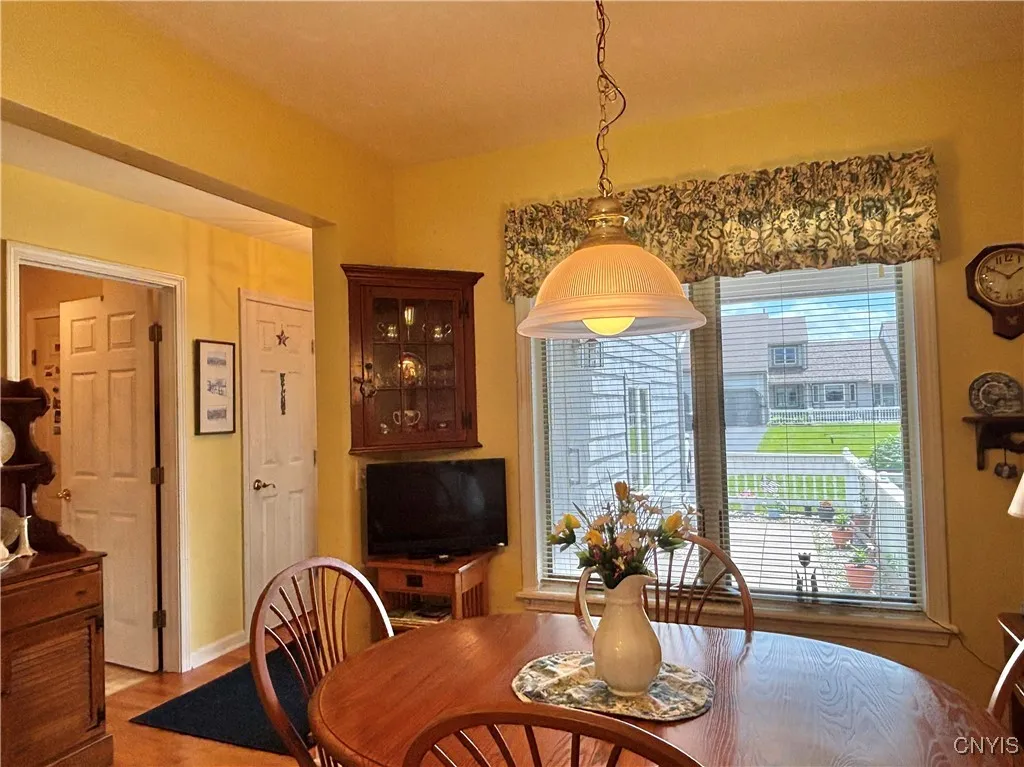 Dining area.  Laundry room is in the background.  Notice the coat closet in the entry foyer.