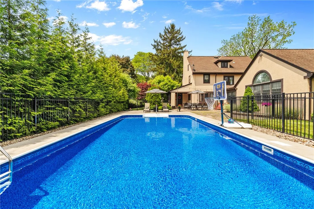 This heated in-ground pool is the ultimate summer destination—perfect for cooling off on hot days or enjoying friendly games of poolside basketball.