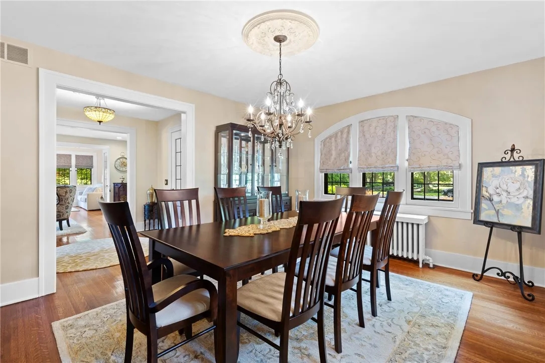 The home has been freshly painted in a palette of neutral, inviting tones, and its original architectural details have been carefully restored to enhance its timeless appeal.