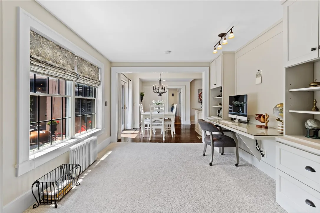 Hide all your electronics and homework in the Custom built ins and desk area. This flex space can also make a perfect bar, coffee or work space.