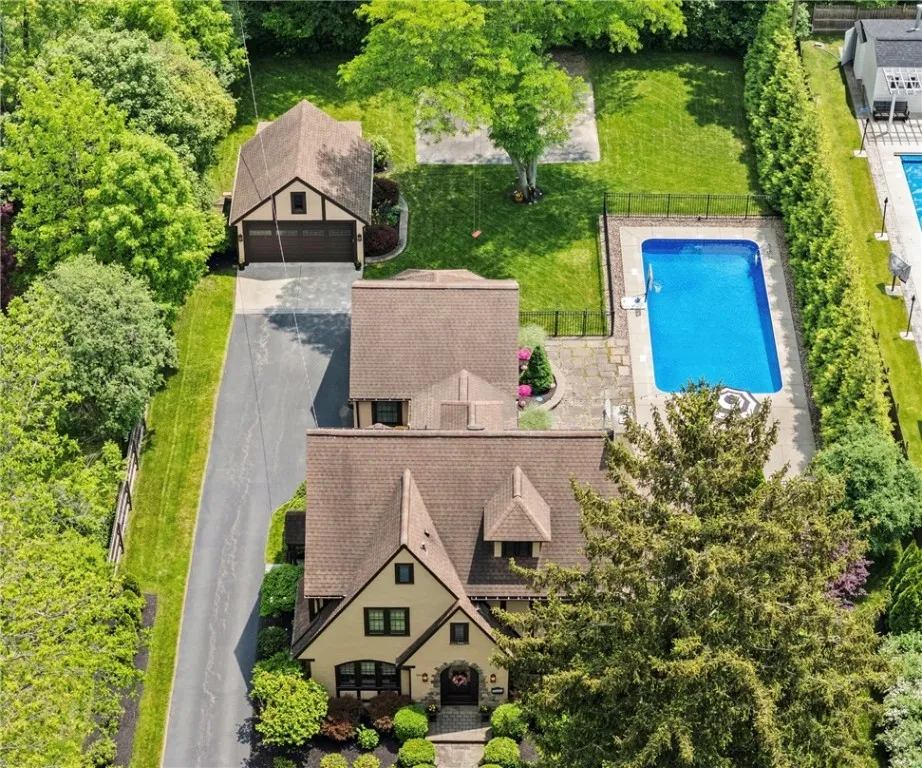 This .6 acre lot boasts privacy, a manicured lawn and mature landscaping.