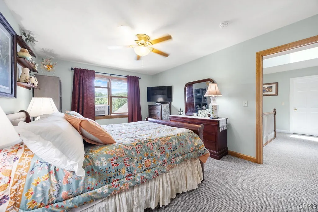 Upstairs, there are two more bedrooms. Here is one of them.