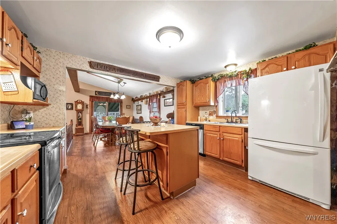 Kitchen Showing Fridge.  Kitchen Appliances Stay!