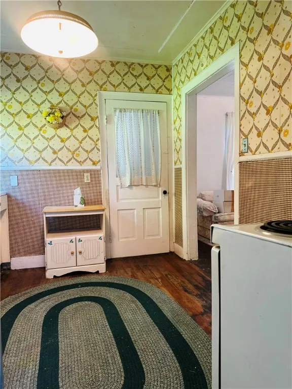 Unit 2 - Kitchen - Door leads to the full bath
