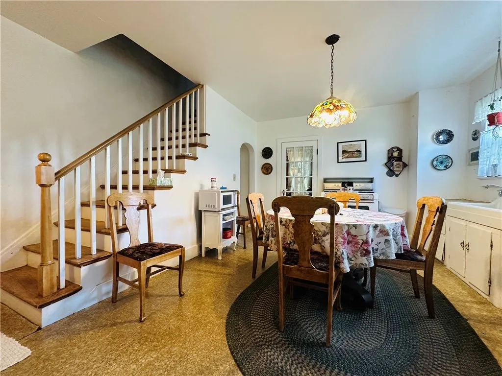 Unit 1 - Kitchen - Stairs leading to the 2nd floor.